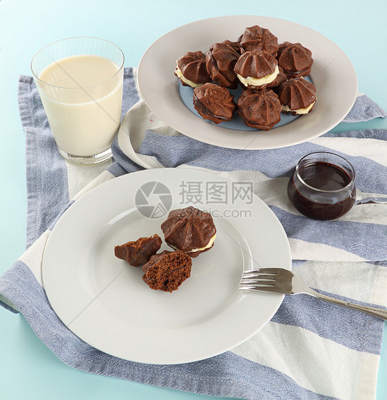 巧克力明星饼干烹饪小吃牛奶味道浪费美味食物铺张奶制品餐巾图片