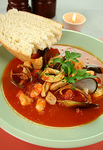 地中海食品救济会美食海鲜贝类烹饪鱿鱼味道香菜对虾用餐面包图片