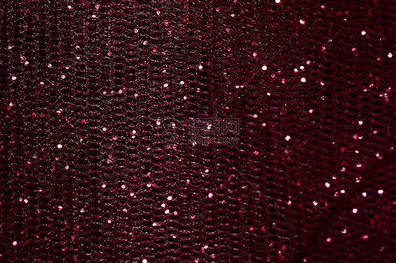 红织物斑点火花光学红色墙纸背景镜片微光纺织品装饰品图片