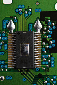 绿色印刷电路板上的微芯片图片