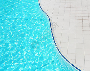 游泳池部分波纹闲暇酒店反射娱乐水池蓝色海浪涟漪游泳背景图片
