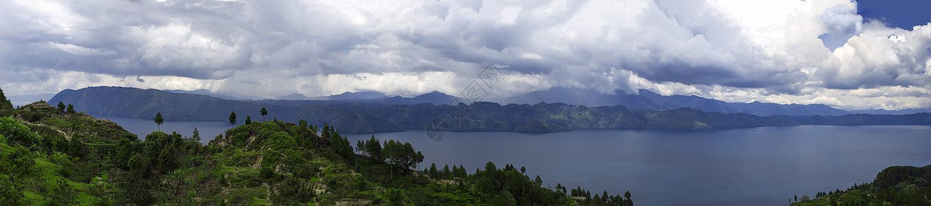 托巴帕诺拉马湖鸟羽情调蓝色火山爬坡异国热带全景天空图片