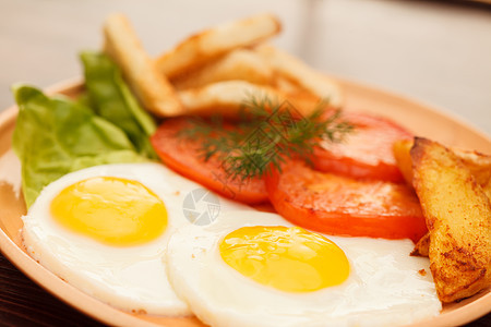 带蔬菜的炒鸡蛋美食食物草本植物盘子面包午餐油炸土豆橙子早餐图片