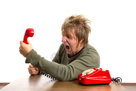 电话呼叫男性男人服务台中心办公室愤怒挫折工作桌子压力图片