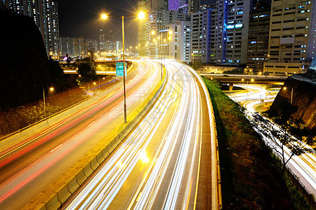 夜间交通踪迹通道建筑速度摩天大楼街道城市灯光景观运输图片