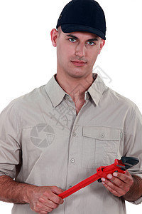 手持扳手的杂工红色黑色商务修理工边缘耳朵褐色钻孔工具零售商图片