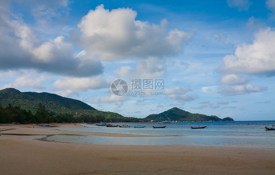 海上渔船情调蓝色海岸天空旅游热带岩石海滩天堂海洋图片