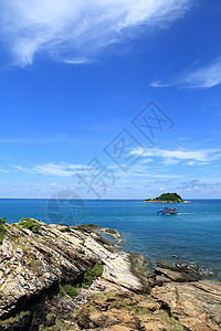 泰国沙美岛海岸线天空叶子波浪海滩树叶热带阳光植被植物群图片