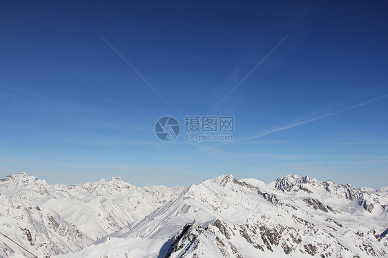 冬季山区假期运动阳光风景全景顶峰单板环境旅行天空图片