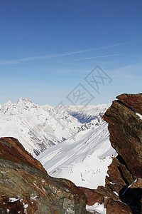 冬季山区单板运动岩石阳光全景天空气候蓝色冰川荒野图片