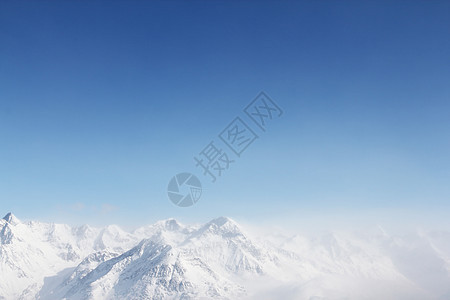 山峰峰假期旅行童话全景阳光首脑环境季节旅游滑雪图片