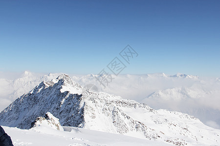 山峰峰童话旅行日出高山天空阳光环境滑雪旅游天气图片