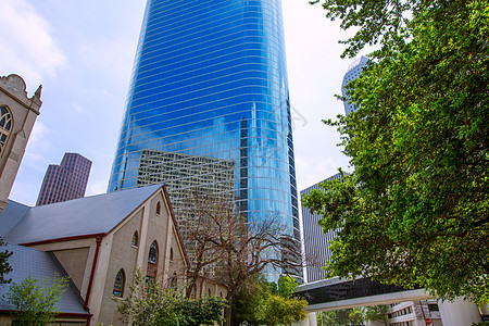 休斯顿市中心摩天大厦 蓝色的天空镜办公室玻璃市中心工作景观职场城市摩天大楼镜子树木图片