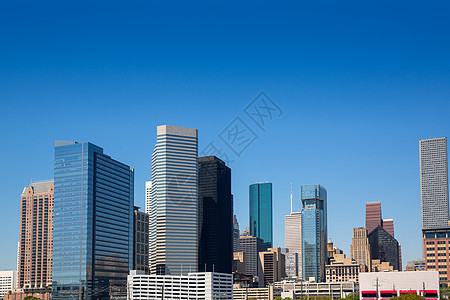 休斯顿市中心的摩天大楼 在蓝色的天空上图片