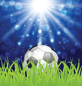 绿草上的足球球和闪光效应图片
