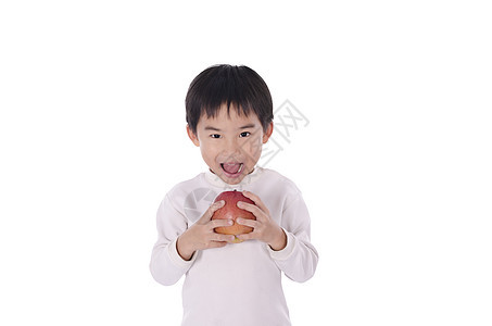 可爱的小男孩吃苹果孩子衬衫情感童年男性食物幼儿园红色儿童白色图片