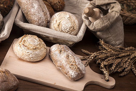 传统面包篮子帆布木头蜂蜜小麦团体包子购物食物地球图片