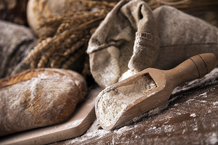 传统面包谷物团体食物小麦白色购物桌子棕色蜂蜜包子图片