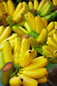 香蕉集团黄色营养热带水果生产背景图片