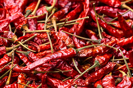 靠近日晒辣椒 食物成分寒冷香料市场厨房蔬菜宏观红色烹饪美食胡椒图片