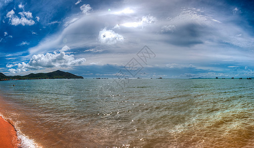 海滩沙滩蓝色太阳游客风景天堂闲暇气候假期全景支撑图片