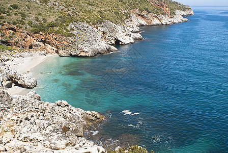 圣贝尼代托西西里Zingaro自然保护区晴天旅游远足海岸旅行假期岩石示波器地标蓝色背景