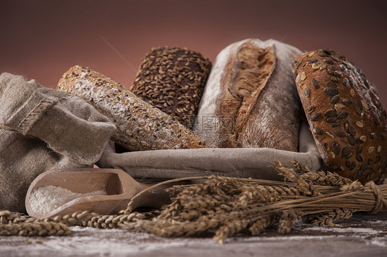 传统面包地球篮子包子桌子帆布粮食蜂蜜谷物食物棕色图片