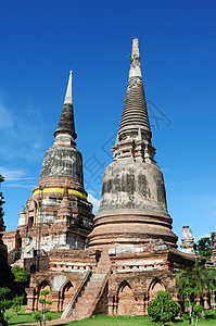 泰国古代瓦特旅行宝塔建筑学连体废墟历史王国金子天空宗教图片