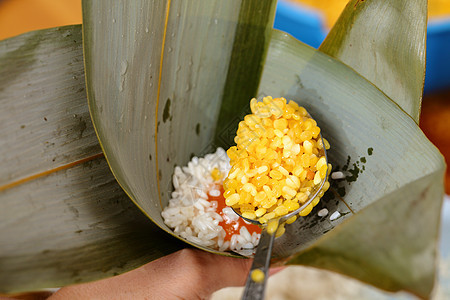 自制稻田加料工艺勺子烹饪节日饺子文化食物程序竹子绿色叶子图片