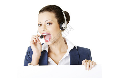 年轻漂亮的呼叫中心工人 手持空白签名板卡片女性商业办公室商务横幅电话广告标语人士背景图片
