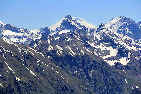 俄罗斯高加索地区的落基山脉地区风景顶峰首脑高度石头爬坡岩石冰川悬崖图片