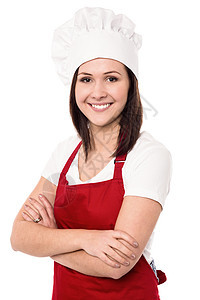 充满自信的年轻女厨师酒店职业快乐餐饮面包腰部工作室厨房食谱商业图片
