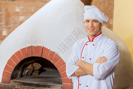 年轻男厨师面粉面包烹饪男人男性糕点面团用具美食厨房图片