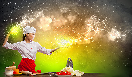 亚洲女性用魔法烹饪胡椒面粉牛奶蔬菜食物手指帽子围裙沙拉空气图片