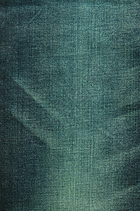 粗蓝色牛仔裤的纹理背景服装口袋材料织物蓝色纺织品衣服编织棉布服饰图片