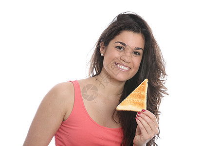 女青年食用一小块吐司白色面包吸引力女士头发图片
