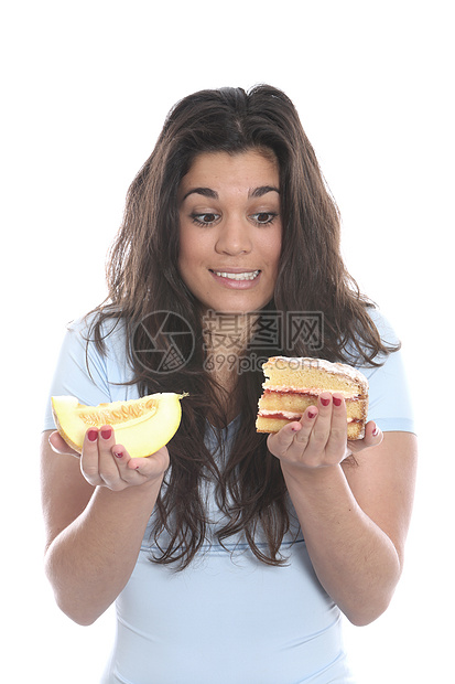 女青年持有美食和蛋糕的年青妇女女士水果吸引力白色健康头发图片