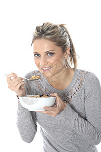 女青年食用早餐水果谷物和水果的早饭女士白色图片