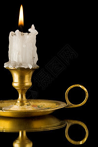 蜡烛黄铜烛光古董古铜色飞碟活力燃烧反射烛台火焰图片