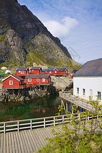 挪威的渔船棚胜地房子码头红色风景峡湾钓鱼大豆村庄小屋图片