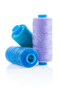 现代缝纫机针线活细绳纺织品蓝色工具宏观白色木头修理工作图片