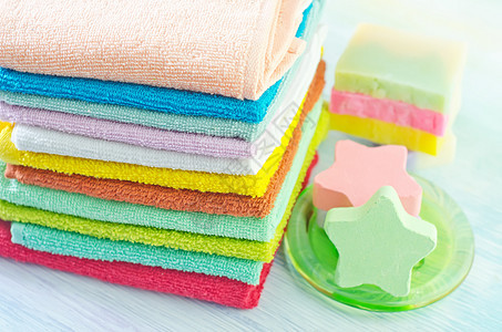 彩色毛巾纺织品洗澡面巾酒店材料纤维肥皂回旋温泉吸收图片
