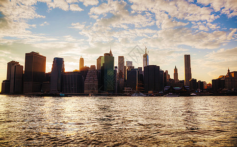 日落时纽约市市风景建筑学摩天大楼金融市中心码头旅行景观地标城市办公室图片