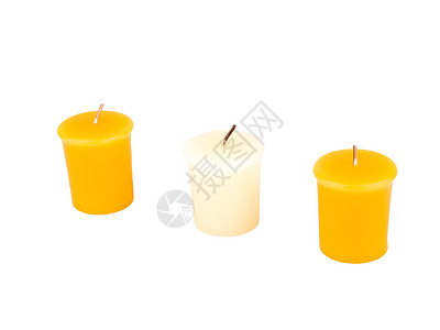 三个蜡烛灯芯黄色三重奏白色背景图片