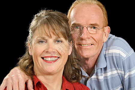 快乐的中年夫妇精神温暖亲和力婚姻感情妻子忠诚眼镜奉献夫妻图片