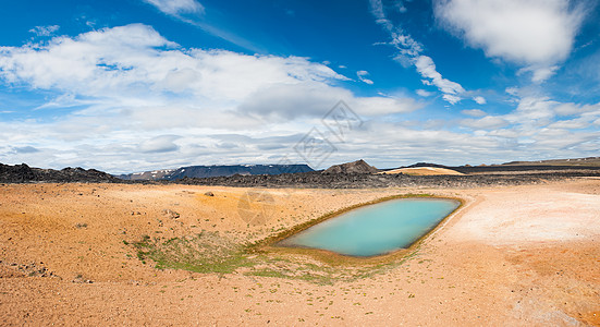 热热池地标乳白色地质学山脉天空橙子天蓝色圆形风景陨石图片