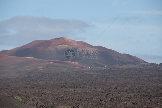 兰萨罗特的某个地方岩石荒野骨灰阳光海滩时间自然元素日光旅行目的地图片