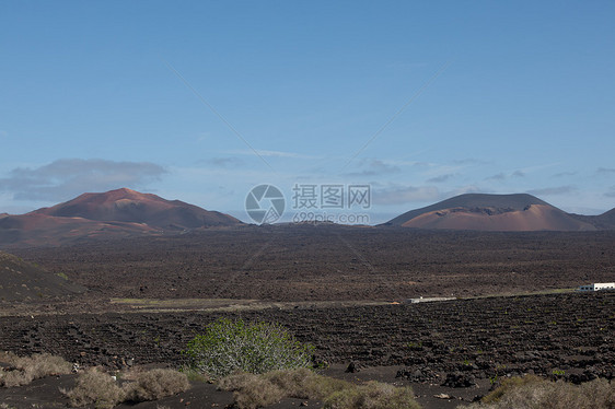 兰萨罗特的某个地方岩石沙漠旅行爬坡天空海滩目的地日光时间自然元素图片