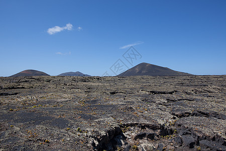 兰萨罗特的某个地方日光时间目的地阳光沙漠骨灰旅行爬坡海滩自然元素图片