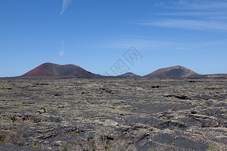 兰萨罗特的某个地方天空爬坡海滩目的地时间阳光荒野沙漠自然元素骨灰图片